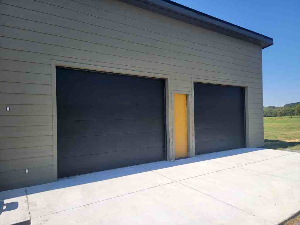 Black Flush Panel garage Doors installed by Georgia Garage Solutions