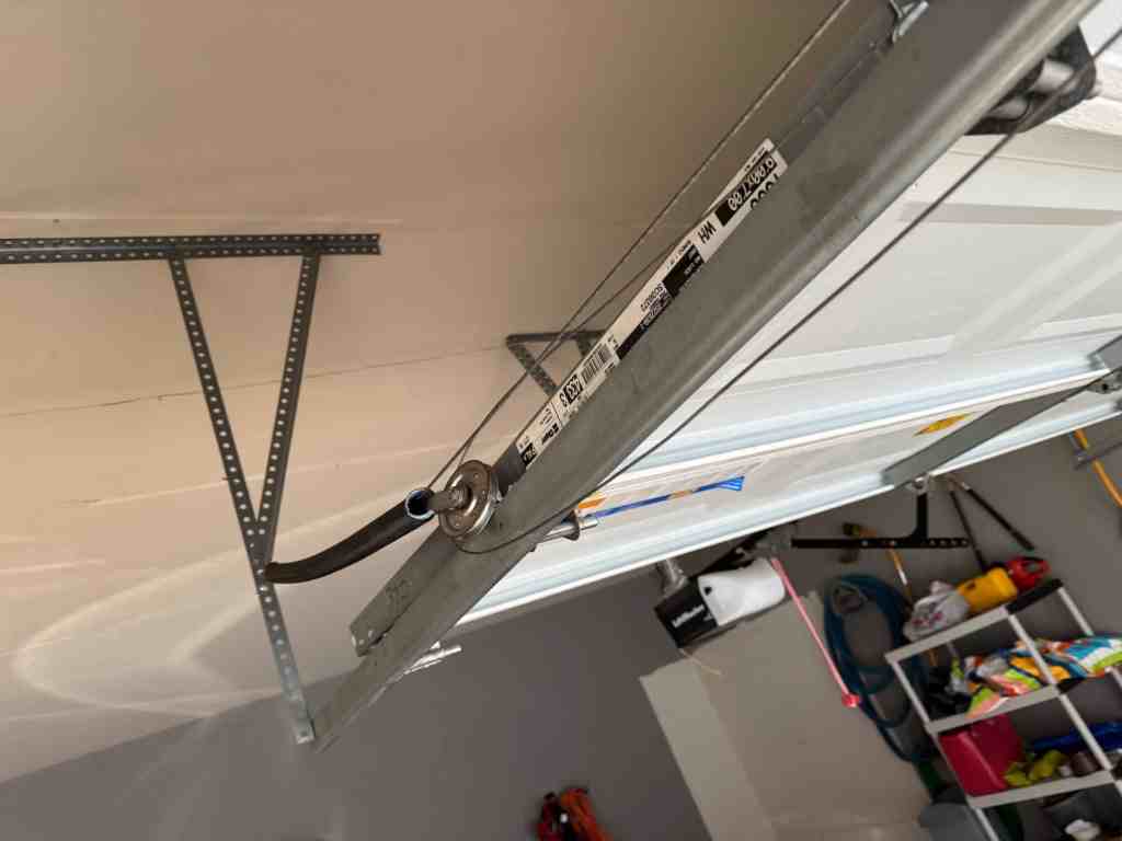 Garage door extension spring system